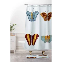 Elisa Bell Fall Butterflies Memory Foam Bath Mat Blue - Deny Designs
