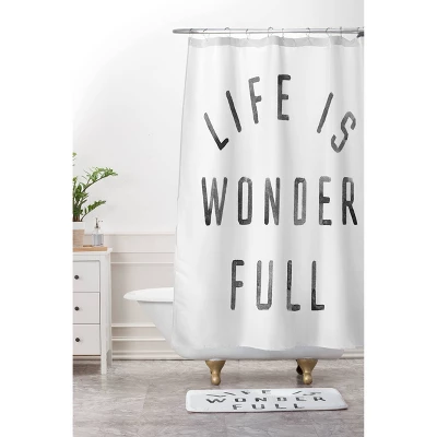 'Life Is Wonderful' Memory Foam Bath Mat - Deny Designs