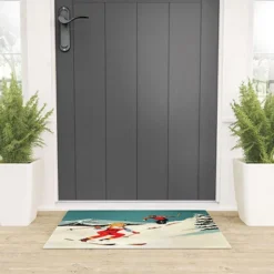 The Whiskey Ginger Retro Skiing Couple Welcome Mat - Society6